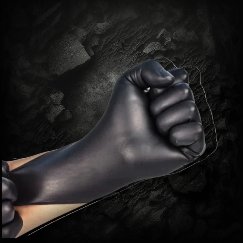 Gant jetable en nitrile noir Veloria pour detailing automobile, offrant une excellente protection et une bonne prise.