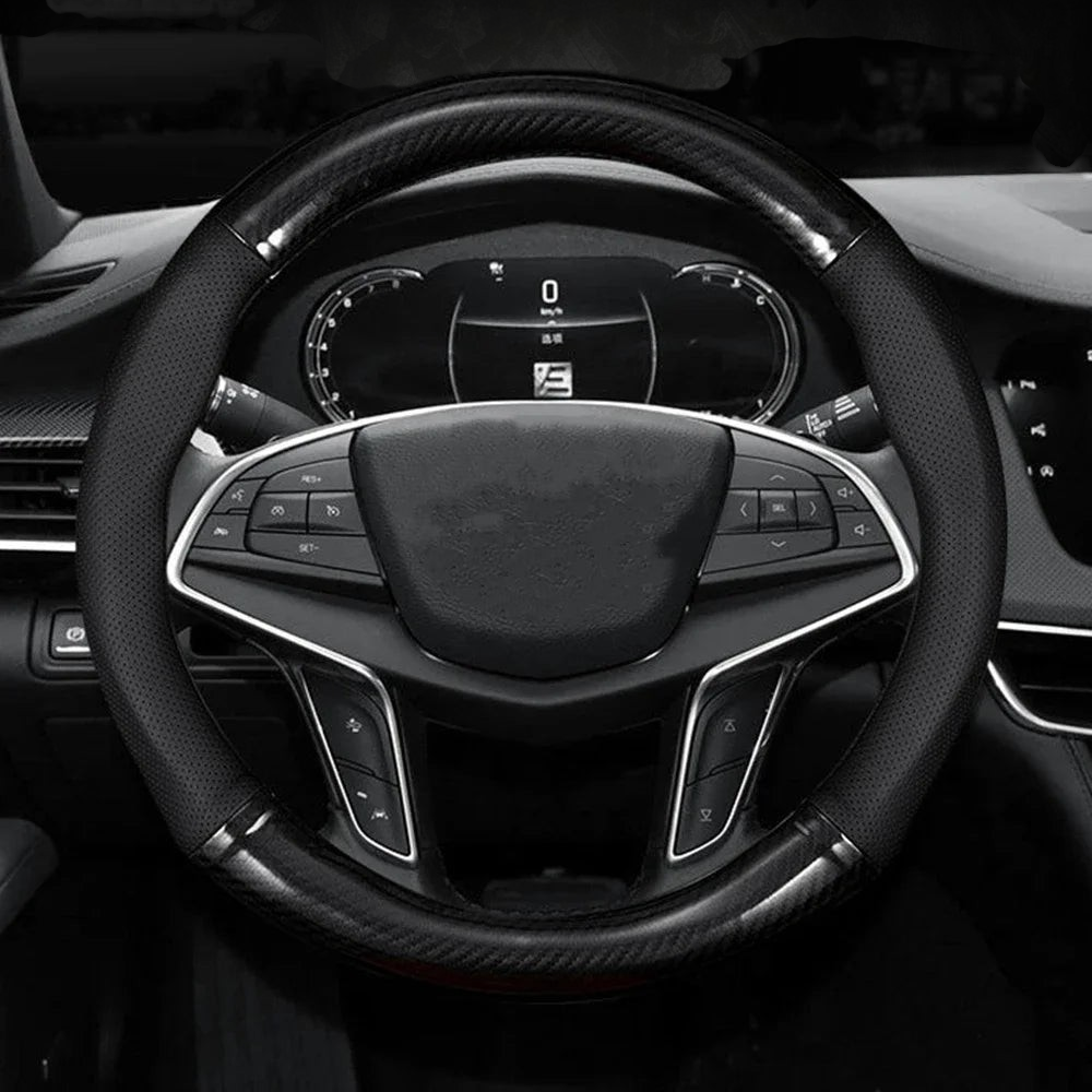 Housse de volant Veloria noire en cuir synthétique effet carbone 3D installée sur un volant de voiture